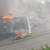 Newcastle’s Central Motorway was closed as firefighters tackled the blaze. Photo: Adam Bartch.