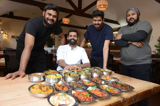 The team at Dosa Kitchen with some of their dishes. Photo: Sorted PR. 