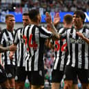 Miguel Almiron of Newcastle United celebrates scoring with new team mate Sandro Tonali of Newcastle United during the pre-season friendly match between Rangers and Newcastle at Ibrox Stadium on July 18, 2023 in Glasgow, Scotland. 