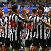 Miguel Almiron of Newcastle United celebrates scoring with new team mate Sandro Tonali of Newcastle United during the pre-season friendly match between Rangers and Newcastle at Ibrox Stadium on July 18, 2023 in Glasgow, Scotland. 