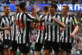 Miguel Almiron of Newcastle United celebrates scoring with new team mate Sandro Tonali of Newcastle United during the pre-season friendly match between Rangers and Newcastle at Ibrox Stadium on July 18, 2023 in Glasgow, Scotland. 