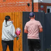 Members of the community lay flowers at the scene of the crash on Turnstone Road, Walsall.