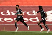 Newcastle United midfielder Joe Willock (left) and Allan Saint-Maximin. (Photo by Clive Brunskill/Getty Images)