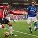 Tino Livramento of Southampton crosses the ball during the Premier League match between Southampton and Everton at St Mary’s Stadium on February 19, 2022 in Southampton, England. 