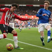 Tino Livramento of Southampton crosses the ball during the Premier League match between Southampton and Everton at St Mary’s Stadium on February 19, 2022 in Southampton, England. 