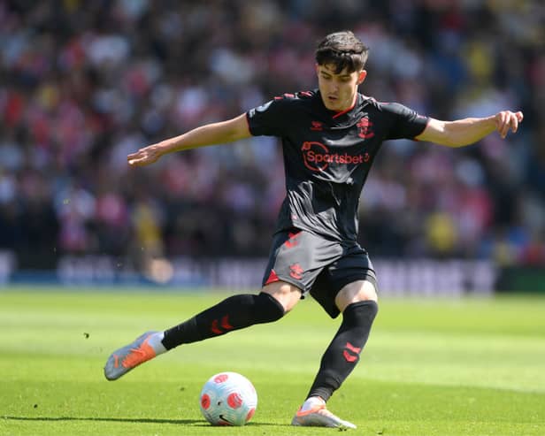 Tino Livramento of Southampton shoots during the Premier League match between Brighton & Hove Albion and Southampton at American Express Community Stadium on April 24, 2022 in Brighton, England.