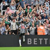 Alexander Isak of Newcastle United celebrates after scoring the team’s second goal with the fans during the Premier League match between Newcastle United and Aston Villa at St. James Park on August 12, 2023 in Newcastle upon Tyne, England. 