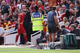  Alexis Mac Allister of Liverpool leaves the pitch after being shown a red card during the Premier League match between Liverpool FC and AFC Bournemouth at Anfield on August 19, 2023 in Liverpool, England. (Photo by George Wood/Getty Images)
