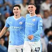 Manchester City duo Julian Alvarez (left) and Phil Foden (right). (Photo by Michael Regan/Getty Images)
