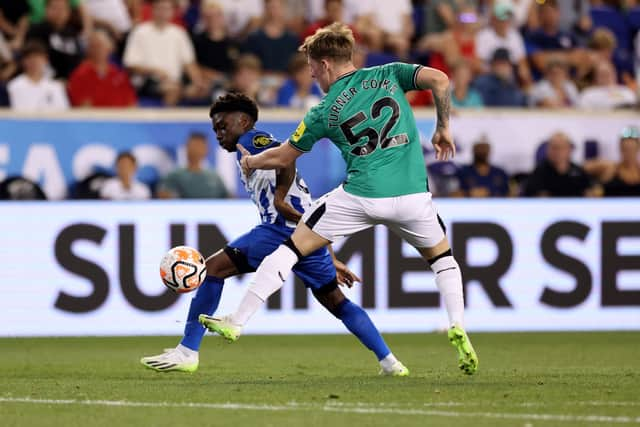 Tariq Lamptey of Brighton & Hove Albion and Jay Turner-Cooke of Newcastle United battle for the ball  during the Premier League Summer Series match between Brighton & Hove Albion and Newcastle United at Red Bull Arena on July 28, 2023 in Harrison, New Jersey. 