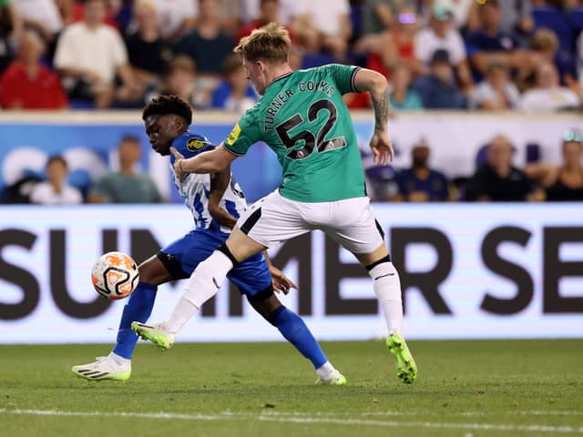 Tariq Lamptey of Brighton & Hove Albion and Jay Turner-Cooke of Newcastle United battle for the ball  during the Premier League Summer Series match between Brighton & Hove Albion and Newcastle United at Red Bull Arena on July 28, 2023 in Harrison, New Jersey. 