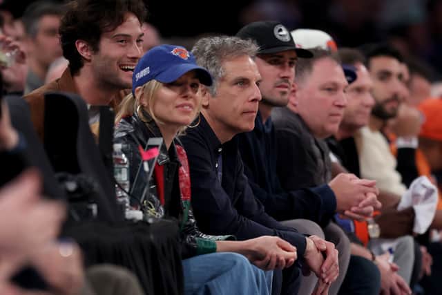 NEW YORK, NEW YORK - APRIL 23: Actors Sienna Miller and Ben Stiller attend Game Four of the Eastern Conference First Round Playoffs between the New York Knicks and the Cleveland Cavaliers at Madison Square 
