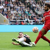 Sven Botman of Newcastle United blocks the shot of Mohamed Salah of Liverpool during the Premier League match between Newcastle United and Liverpool FC at St. James Park on August 27, 2023 in Newcastle upon Tyne, England.