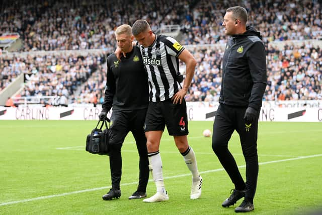 Sven Botman limped off against Liverpool (Image: Getty Images)