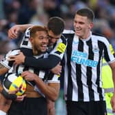 Joelinton of Newcastle United celebrates scoring the 3rd goal with Bruno Guimaraes and Sven Botman during the Premier League match between Leicester City and Newcastle United at The King Power Stadium on December 26, 2022 in Leicester, United Kingdom. (Photo by Marc Atkins/Getty Images)