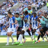 Joelinton of Newcastle United heads the ball during the Premier League match between Brighton & Hove Albion and Newcastle United at American Express Community Stadium on August 13, 2022 in Brighton, England. (Photo by Mike Hewitt/Getty Images)