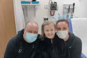 Grace Frazer with her parents.