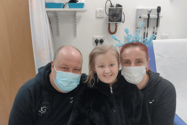 Grace Frazer with her parents.