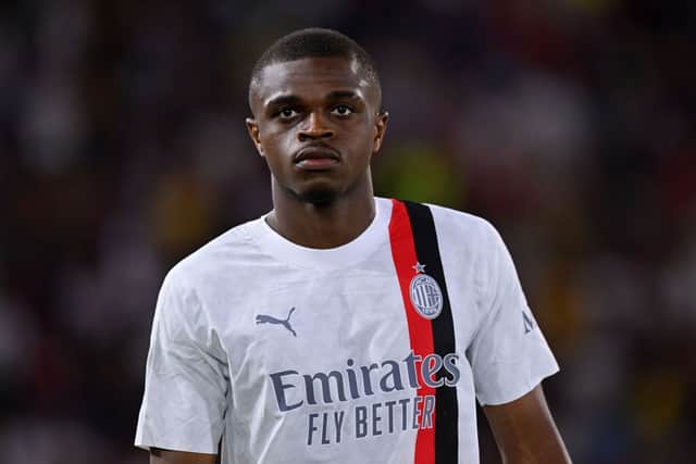 AC Milan defender Pierre Kalulu is set to miss the clash against Newcastle United. Photo by Alessandro Sabattini/Getty Images)