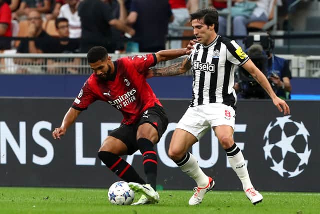 Ruben Loftus-Cheek of AC Milan challenges for the ball with Sandro Tonali of Newcastle United during the UEFA Champions League Group F match between AC Milan and Newcastle United FC at Stadio Giuseppe Meazza on September 19, 2023 in Milan, Italy. (Photo by Marco Luzzani/Getty Images)