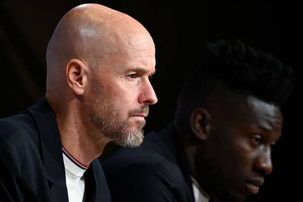 Manchester United manager Erik ten Hag and goalkeeper Andre Onana.  (Photo by TOBIAS SCHWARZ/AFP via Getty Images)