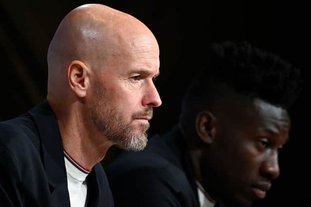 Manchester United manager Erik ten Hag and goalkeeper Andre Onana. (Photo by TOBIAS SCHWARZ/AFP via Getty Images)