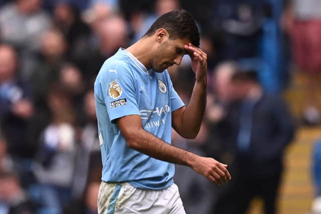 Manchester City’s Spanish midfielder Rodri. (Photo by OLI SCARFF/AFP via Getty Images)