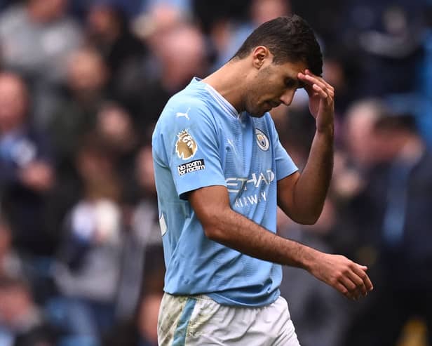 Manchester City’s Spanish midfielder Rodri. (Photo by OLI SCARFF/AFP via Getty Images)