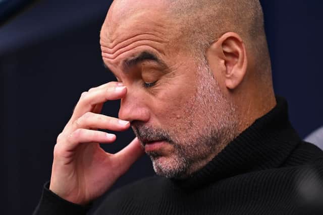 Manchester City boss Pep Guardiola. (Photo by OLI SCARFF/AFP via Getty Images)