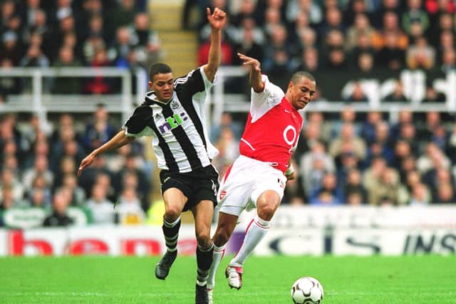 Gilberto of Arsenal is challenged by Jermaine Jenas of Newcastle during the Premier League match between Newcastle United and Arsenal on February 9, 2003  (Arsenal FC via Getty Images)