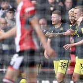 Newcastle United midfielder Sean Longstaff scores against Sheffield United. (Photo by DARREN STAPLES/AFP via Getty Images)