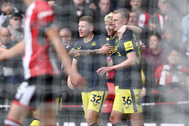 Newcastle United midfielder Sean Longstaff scores against Sheffield United. (Photo by DARREN STAPLES/AFP via Getty Images)