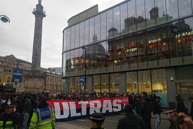 PSG fans march through Newcastle ahead of matchday two in the Champions League.  