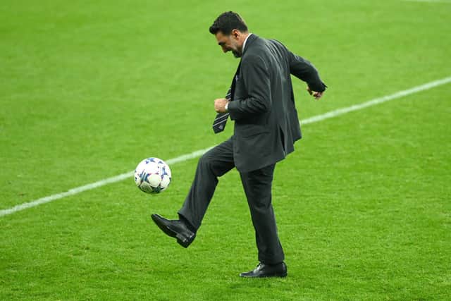 Newcastle chairman Yasir Al-Rumayyan in action on the pitch after the UEFA Champions League match between Newcastle United FC and Paris Saint-Germain at St. James Park on October 04, 2023 in Newcastle upon Tyne, England. (Photo by Stu Forster/Getty Images)