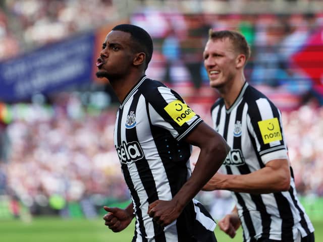 Alexander Isak of Newcastle United celebrates after scoring their sides first goal during the Premier League match between West Ham United and Newcastle United at London Stadium on October 08, 2023 in London, England.