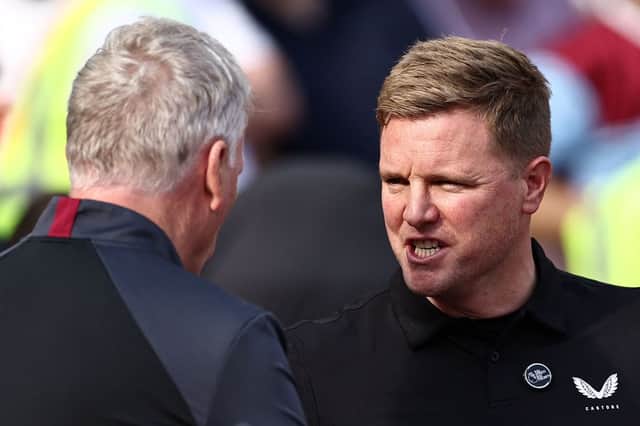 West Ham United's Scottish manager David Moyes (L) grets Newcastle United's English head coach Eddie Howe ahead of the English Premier League football match between West Ham United and Newcastle United at the London Stadium, in London on October 8, 2023. (Photo by HENRY NICHOLLS / AFP)