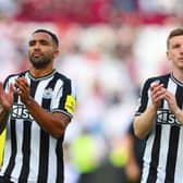 Callum Wilson and Matt Targett of Newcastle United applaud fans following the Premier League match between West Ham United and Newcastle United at London Stadium on October 08, 2023 in London, England. (Photo by Tom Dulat/Getty Images)