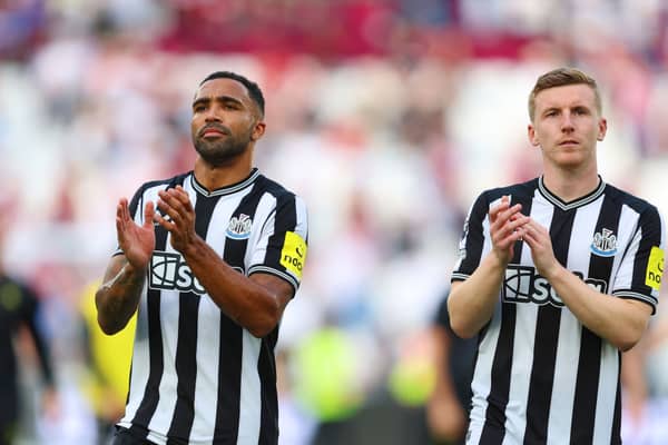 Callum Wilson and Matt Targett of Newcastle United applaud fans following the Premier League match between West Ham United and Newcastle United at London Stadium on October 08, 2023 in London, England. (Photo by Tom Dulat/Getty Images)