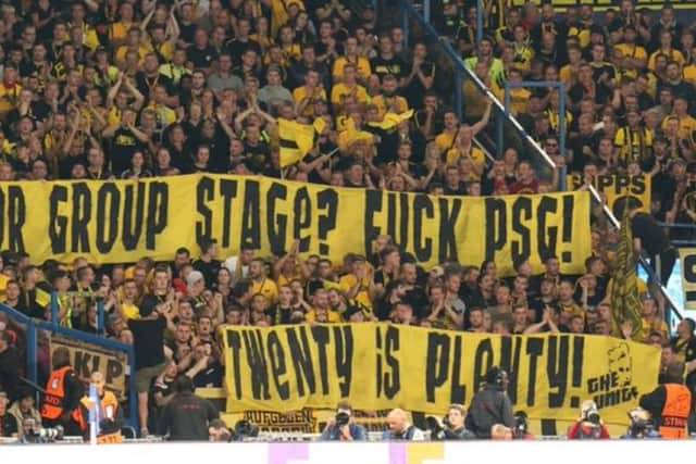 Dortmund fans make their feelings clear on ticket pricing on their recent visit to Paris.
