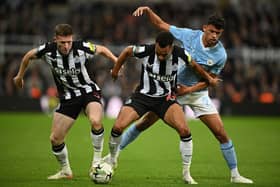 Newcastle United duo Elliot Anderson & Jacob Murphy.   (Photo by OLI SCARFF/AFP via Getty Images)