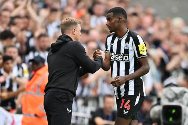  Alexander Isak of Newcastle United is embraced by manager Eddie Howe following his substitution during the Premier League match between Newcastle United and Aston Villa at St. James Park on August 12, 2023 in Newcastle upon Tyne, England. (Photo by Stu Forster/Getty Images)