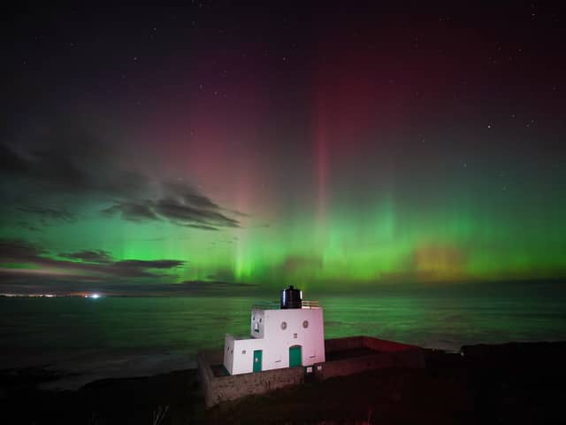 The aurora borealis, also known as the northern lights, appears over Bamburgh Lighthouse. Northumberland is one of the best places in the UK to see the Northern lights becuase of its clear skies. 