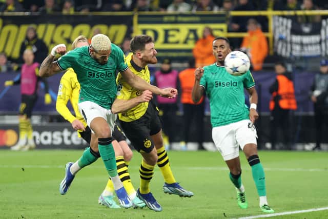 Joelinton of Newcastle United is challenged by Salih Ozcan of Borussia Dortmund during the UEFA Champions League match between Borussia Dortmund and Newcastle United at Signal Iduna Park on November 07, 2023 in Dortmund, Germany. (Photo by Lars Baron/Getty Images)