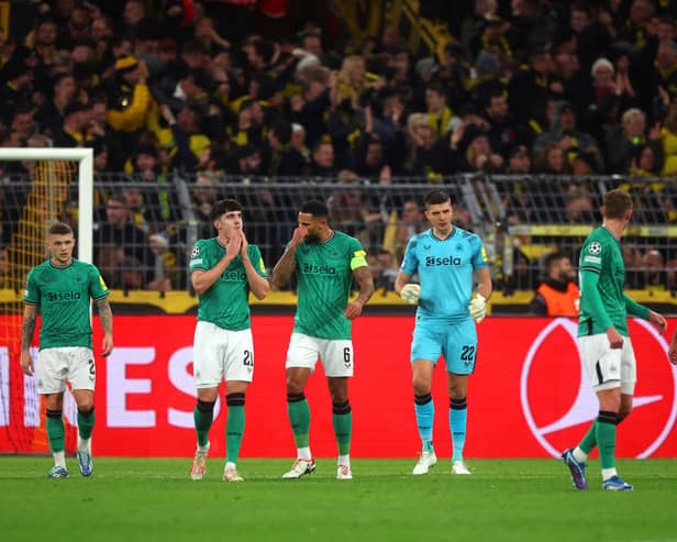 Players of Newcastle United look dejected after conceding a goal during the UEFA Champions League match between Borussia Dortmund and Newcastle United at Signal Iduna Park on November 07, 2023 in Dortmund, Germany. 