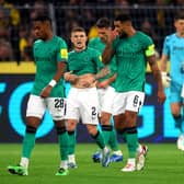 Kieran Trippier (C) and Jamaal Lascelles of Newcastle United react as they leave the pitch for half-time during the UEFA Champions League match between Borussia Dortmund and Newcastle United at Signal Iduna Park on November 07, 2023 in Dortmund, Germany. (Photo by Alex Grimm/Getty Images)