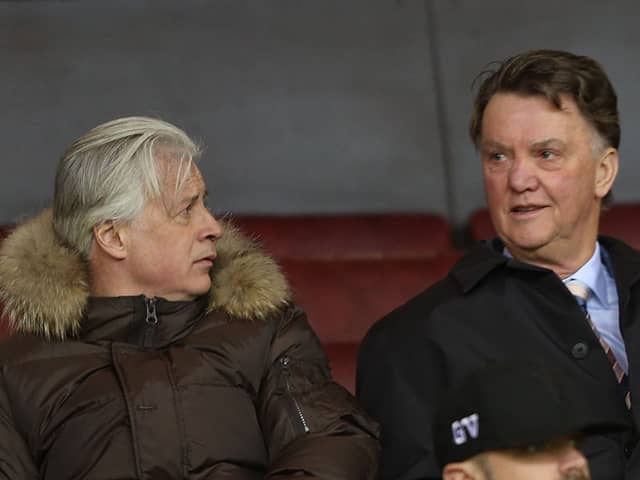 Opposition scout Marcel Bout and  Manager Louis van Gaal of Manchester United watch from the stand during the U21 Premier League match between Manchester United U21s and Norwich City U21s at Old Trafford on February 8, 2016 in Manchester, England.  (Photo by John Peters/Manchester United via Getty Images)