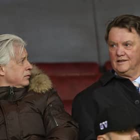 Opposition scout Marcel Bout and  Manager Louis van Gaal of Manchester United watch from the stand during the U21 Premier League match between Manchester United U21s and Norwich City U21s at Old Trafford on February 8, 2016 in Manchester, England.  (Photo by John Peters/Manchester United via Getty Images)