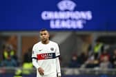 Paris Saint-Germain's French forward #07 Kylian Mbappe looks on during the UEFA Champions League 1st round group F football match between AC Milan and Paris Saint-Germain at the San Siro stadium in Milan on November 7, 2023. (Photo by GABRIEL BOUYS / AFP) (Photo by GABRIEL BOUYS/AFP via Getty Images)