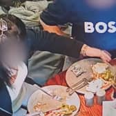 A pub customer has been caught on CCTV placing their own hair into their food in an attempt to get a refund for their meal. (Credit: Tom Croft / SWNS)