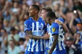 Evan Ferguson of Brighton & Hove Albion celebrates with Pervis Estupinan and Joao Pedro after scoring the team's second goal during the Premier League match between Brighton & Hove Albion and Newcastle United. (Photo by Steve Bardens/Getty Images)
